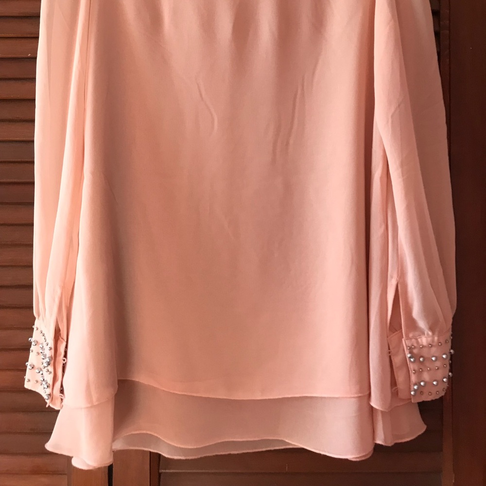 peach blouse